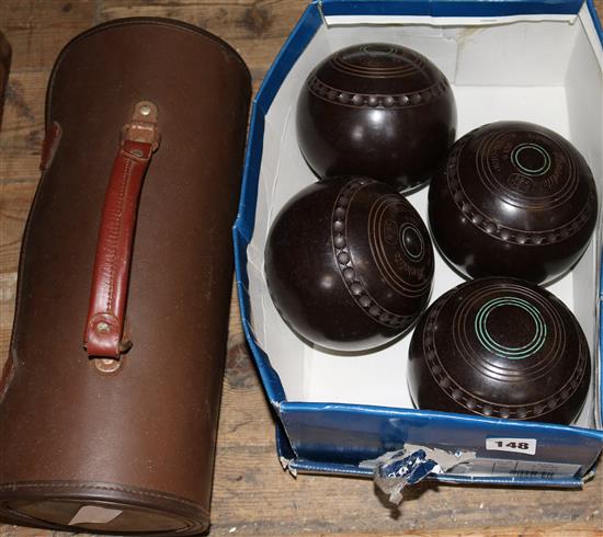 4 bowling balls and a cased set